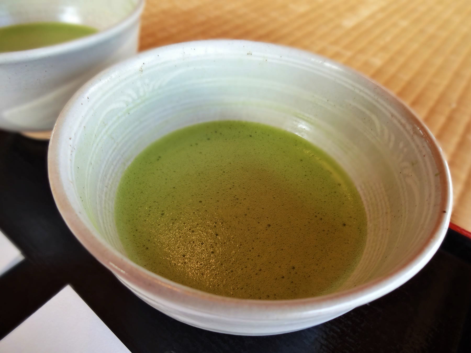 A bowl of prepared matcha served during a Japanese tea ceremony
